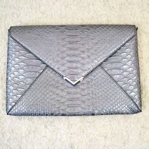 Stella & Dot Embossed Snake Silver Clutch